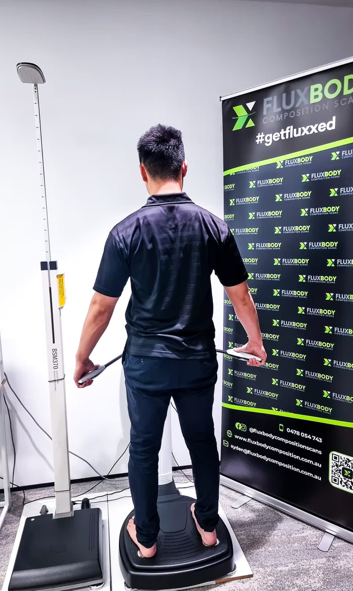 Employee being scanned at an on-site corporate visit