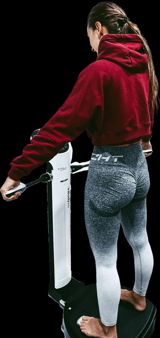 Client standing on the InBody570 during a body composition scan